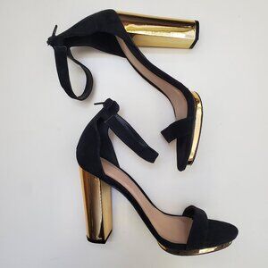 Elegant black with metallic gold high heel shoes
